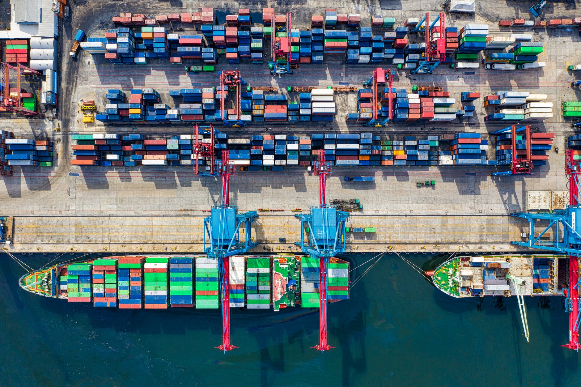 birds eye view photo of freight containers; supply chain can be interrupted during an economic collapse. 