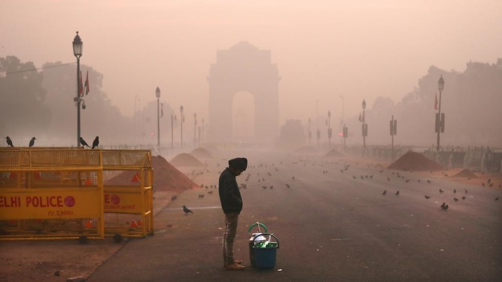 Man standing in street in a toxic air environment
