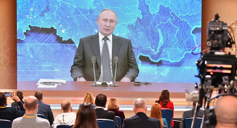 President Valdimir Putin giving a news conference.