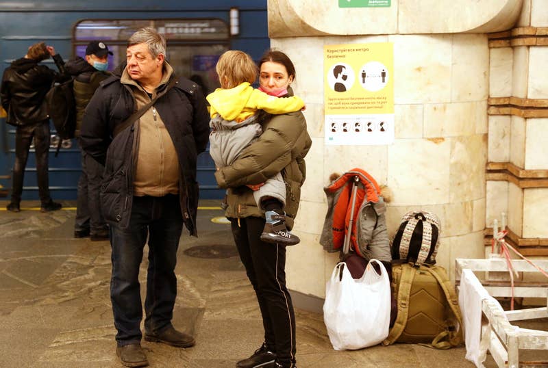 Family taking shelter in a subway station in Kiev